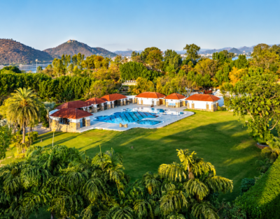 Premium Heritage Suites in Udaipur | 1-Room Retreat With Lap Pool, Shared Pool, Common Garden, Restaurant, Gym & Scenic Aravali View
